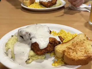 Across The Trax Bar & Grill