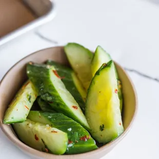 spicy cucumber salad -- garlic, red pepper flakes, rice wine vinegar