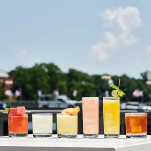 a variety of cocktails on a table