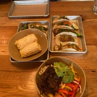 Elote corn, oyster tacos and a beef bowl