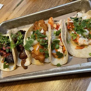 Pork belly, mahi &amp; warm butter lobster tacos