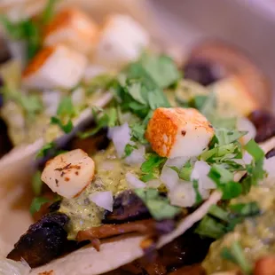 a close up of a taco dish