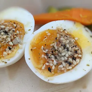 Sesame hardboiled egg with pickled sides. Delicious and well worth the $3 just to try it.
