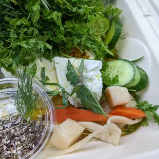 Persian breakfast - za'atar, pickles, cucumber, feta, herbs