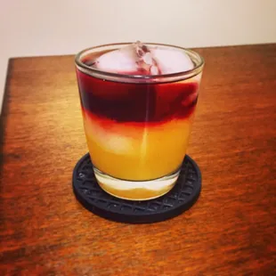 New York Sour: 2 oz high proof bourbon, 1.25 oz natural sweet and sour (academy recipe), float dry red wine (like a Malbec)