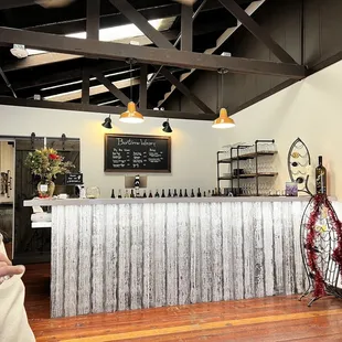 a man drinking a glass of wine