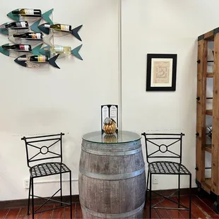 a wine barrel table and chairs