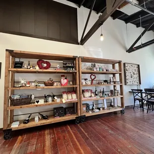 a wine shop with wooden shelves