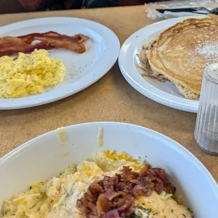 Pancakes, scrambled eggs and bacon.