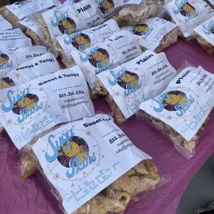 a table with bags of snacks