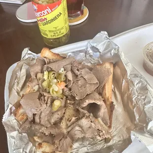 Italian Beef Sandwhich - Italian Beef Sandwhich. I added the Hot Giardiniera once I got home.  Overall decent sammich.