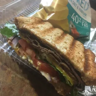 a sandwich in a plastic container