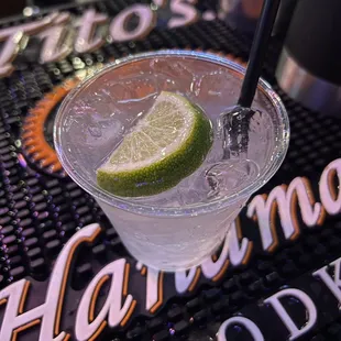 a margarita with a slice of lime