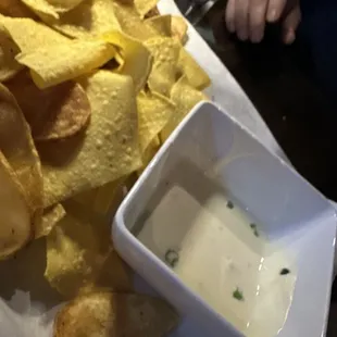 Chips and queso. Tortilla and homemade chips