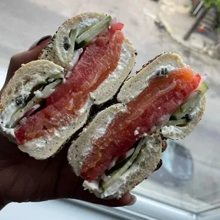 Lox bagel with capers, red onion, tomato and cucumber