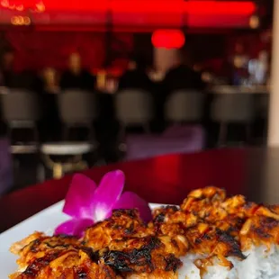 a plate of sushi on a table