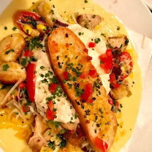 Blue crab fondue- gnocchi, corn, tomato, mushrooms. Crab fondue part is underneath the crostini. Prominent taste of corn. Tasty but rich