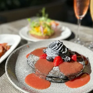 BREAKFAST COMBO SPECIAL: Short Stack Charcoal Pancakes  with Bacon ($19). Available 7am-12pm daily through 9/30/24.