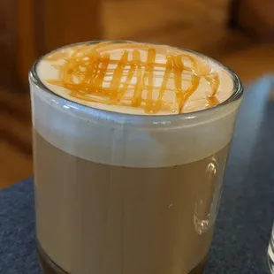 a latte with caramel on top
