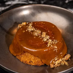 a plate of food with caramel sauce