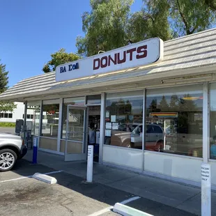 the outside of a donut shop