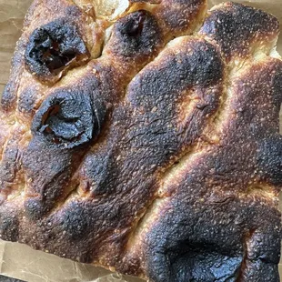 Burnt focaccia they sold me