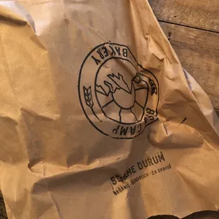 a brown bag with a logo on it