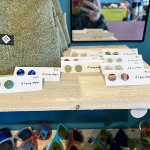 a display of sunglasses and a backpack