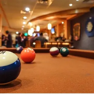 billiard balls on a pool table