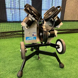 Designated softball pitching machine