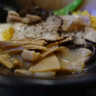 Signature bowl with corn, mushrooms, sprouts added