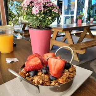 Cool seating with tables for two and picnic tables for groups or for meeting new people.