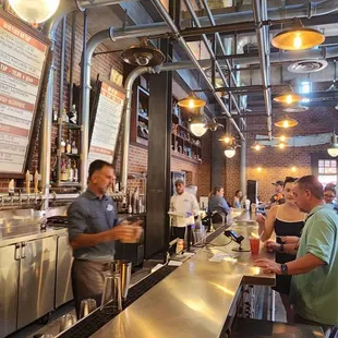 Industrial tap House inside Hollywood studios. Variety of beers hot pretzels charcuterie board, etc.
