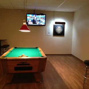 a pool table and bar
