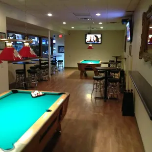 a pool table and bar