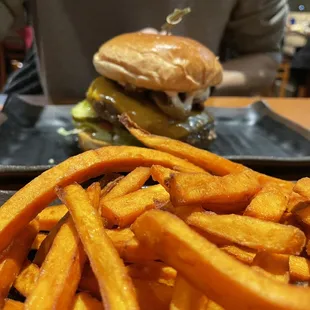 a plate of fries and a burger