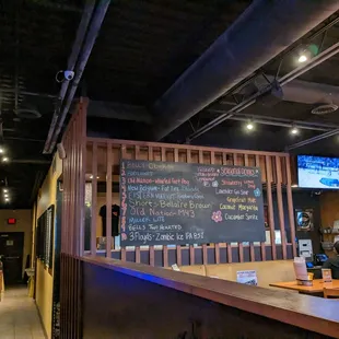 a chalkboard menu on the wall