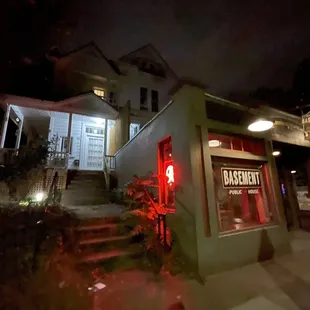 Side view of bar with a house behind it (where people actually live!)