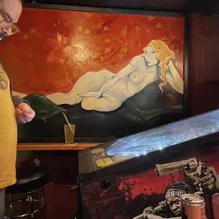 Inside art and 1 of 2 pinball machines here (get quarters from the bartender)
