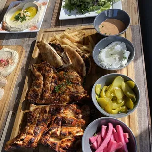 a variety of food on a wooden table
