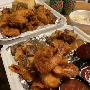 Huge crispy fried shrimp, juicy tenders, buttery potatoes &amp; some delicious slaw. Real Deal... look forward to return visit.