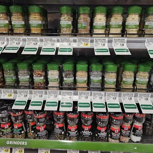  a shelf of spices in a grocery store