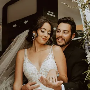 Styled shoot of bride and groom taking photo in a 1970 VW Bus Photo Booth