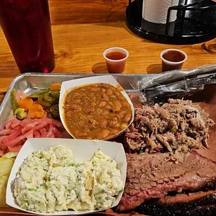 Ordered the brisket mix of lean and fatty plus the green chilie pulled pork with potato salad and the beans.