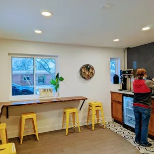 a woman in a kitchen