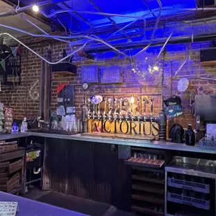 a bar with blue lighting