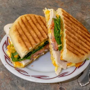 a sandwich cut in half on a plate