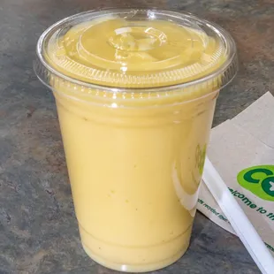 a smoothie in a plastic cup