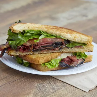 Grilled Pastrami Sandwich on Sourdough with French Fries or Bag of Chips