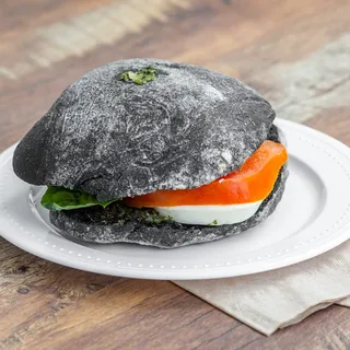 Caprese with Avocado Basil Pesto on Charcoal Ciabatta